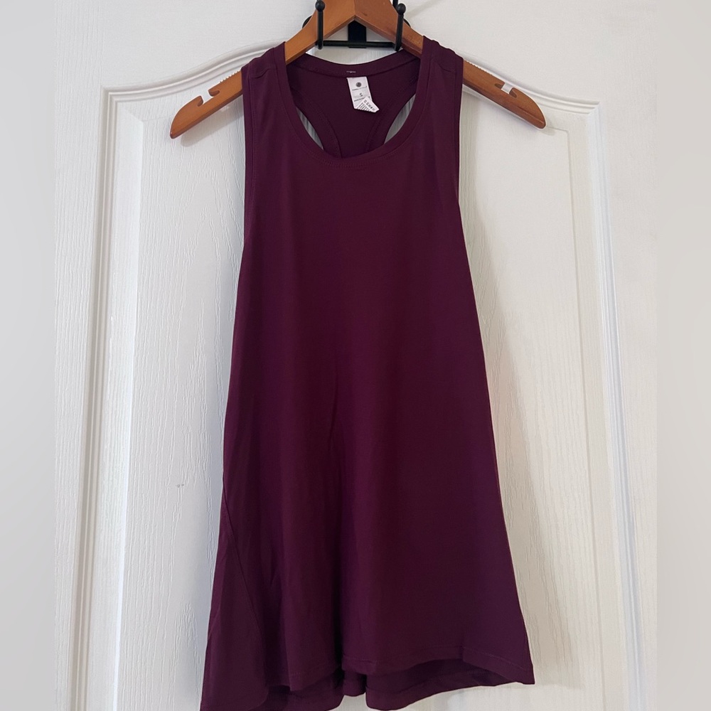 NWT yogalicious top. Super soft with Racerback. Size small